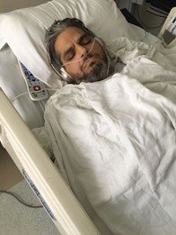 Gabey Abikzer in the period following the accident in which he lost both legs
