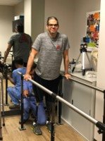 Gabey Abikzer during rehabilitation after losing both legs