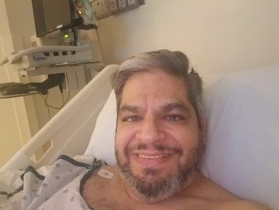 Gabey Abikzer in the period following the accident in which he lost both legs